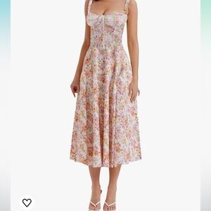 Floral sun dress. Was bought as a size large but fits like a medium.